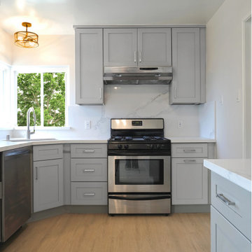 Modern Gray Shaker Kitchen Remodel with White Quartz Countertops