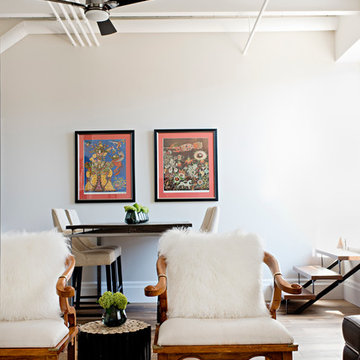 Counter-Height Dining Area in a High-Ceiling Loft
