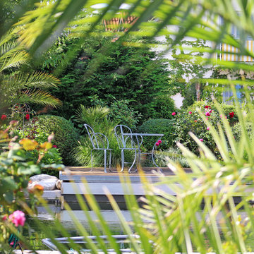 Garten mit Urlaubsflair und Koiteich