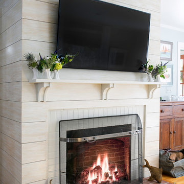 Ship-lap walled fireplace and yes every room needs a TV