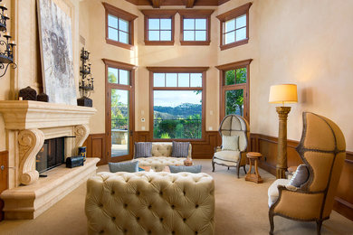 Example of a tuscan living room design in San Diego