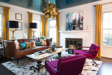 Inspiration for a large eclectic open concept dark wood floor living room remodel in Dallas with white walls, a standard fireplace and a plaster fireplace