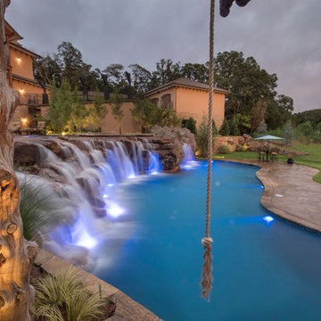 Multi-Level Pool with Rope Swing, Sunken Fire Pit, Waterfalls & Swim Up Bar