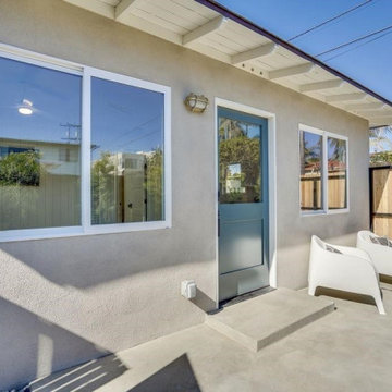 1BR ADU Exterior with Stucco and Blue Door
