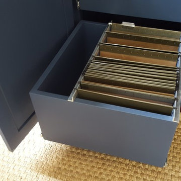 Dark Blue Office Built-in With Center Desk and Pullouts