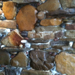 Stone Wall Master Bedroom - Siding And Stone Veneer