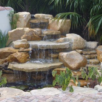 Rock waterfall and pond