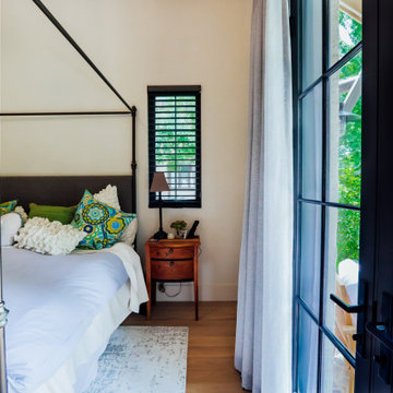 Functional drapes with 2-Finger Pinch Pleat on a Matte Black Traverse Rod