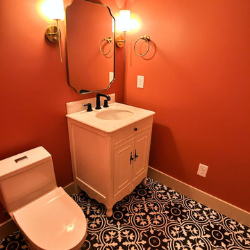 Statement Powder Room: Warm Orange Walls + Timeless Black and White Floral Motif