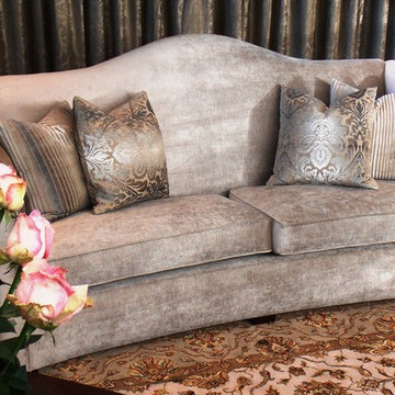 camel back sofa in cream velvet