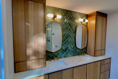 Bathroom - large modern master ceramic tile, gray floor and double-sink bathroom idea in DC Metro with light wood cabinets, a one-piece toilet, white walls and a built-in vanity