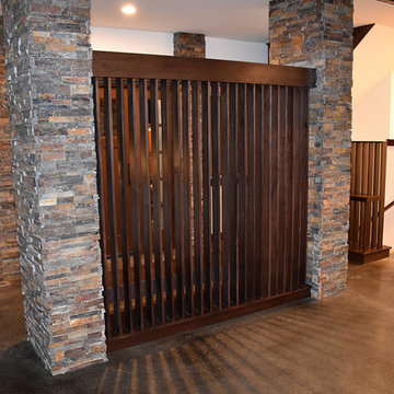 Living area, w/ Foyer and Stair beyond
