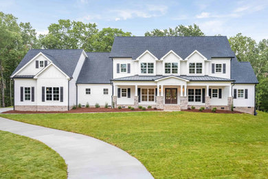 Farmhouse exterior home idea in Other