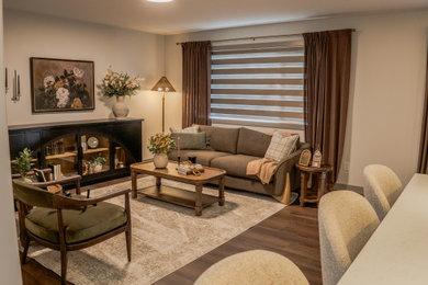 Example of a minimalist vinyl floor and brown floor living room design in Other
