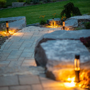 Luxury Backyard Retreat with Armour Stone & Water Feature | Genesis on the Lakes