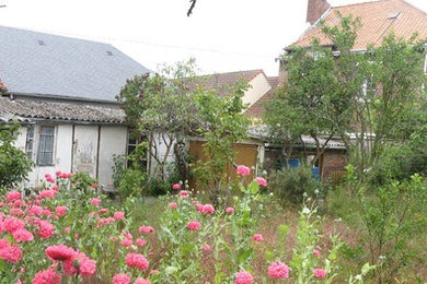 Vue du jardin avant démolition des appentis et de la cuisine