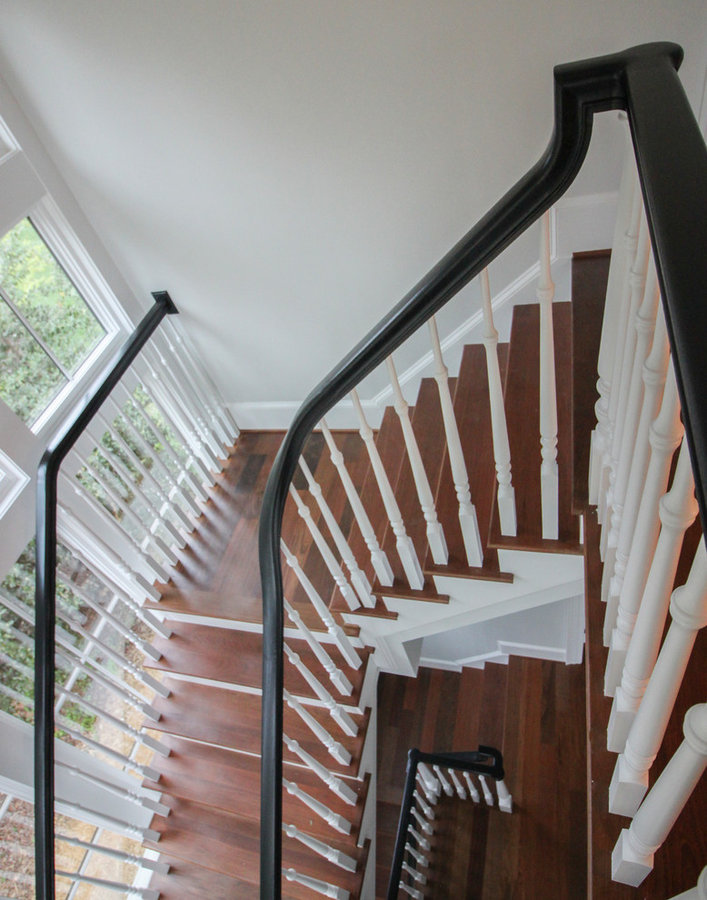 Powerful Impression by Floating Staircase in Suburban Foyer