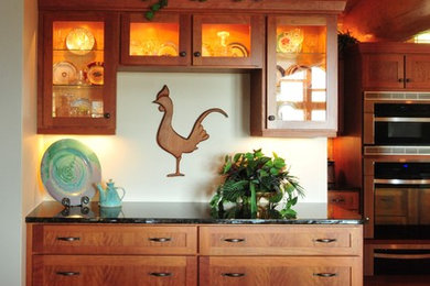 Open concept kitchen - large rustic galley light wood floor open concept kitchen idea in Portland Maine with an undermount sink, shaker cabinets, medium tone wood cabinets, granite countertops, stainless steel appliances and an island