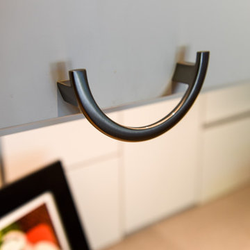 Pulls trick: Dropped below cabinet door = no hands on the white doors