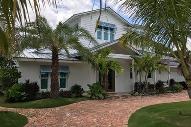 Island style exterior home photo in Miami