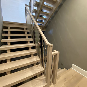 White Oak Stairs with Polished Stainless Steel Balusters