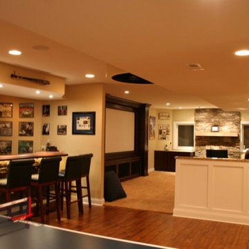 Finished Basement With Theater, Bar and Game Area