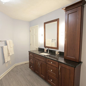 White and Gray MasterBath with Marble Look and Herringbone Tiled Shower