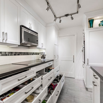 Condo White Galley Kitchen