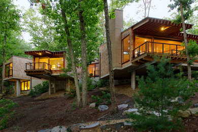 Large minimalist one-story mixed siding exterior home photo in Boston with a metal roof