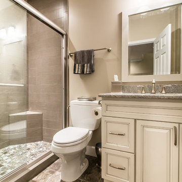 Ashburn Basement with Custom Bar, Custom Shelving, Home Gym, and Bath