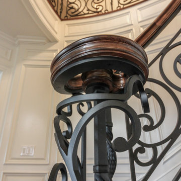 Project #74 | Circular Staircase with Hand-Forged Metal Panels