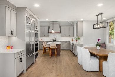 Example of a transitional kitchen design in Seattle