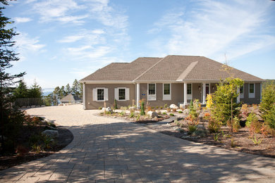 Example of a large minimalist beige two-story wood exterior home design in Other with a hip roof