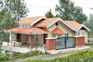 Example of a classic exterior home design in Other