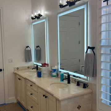 Curd-less walk-in shower; heated floors in bathroom + shower+bench LED