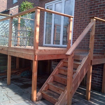 Californian red cedar deck with glass balustrade
