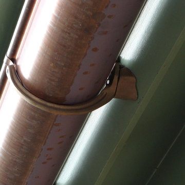 Lead coated copper roof panels and copper gutter installation