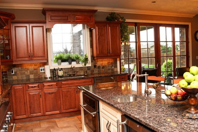 Inspiration for a large timeless u-shaped limestone floor open concept kitchen remodel in Toronto with an undermount sink, raised-panel cabinets, dark wood cabinets, granite countertops, brown backsplash, mosaic tile backsplash, stainless steel appliances and an island