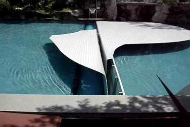 Inspiration for a contemporary pool remodel in New York