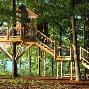 Imagen de jardín rústico, grande, con parque infantil