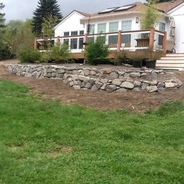 Dry stack boulder retaining wall