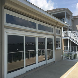 Motorized Rolling Hurricane Shutters- Mulheron Home - Products