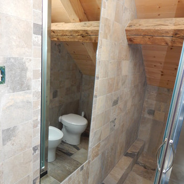Ristrutturazione della casa d'infanzia, alle pendici delle montagne Carniche