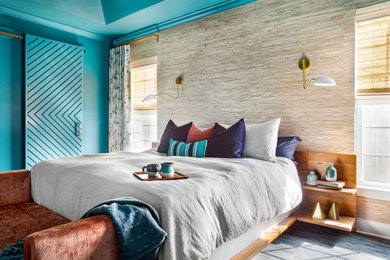Example of a 1950s master vaulted ceiling and wood wall bedroom design in Nashville with blue walls