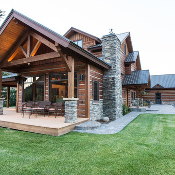 Exterior slab siding and timber frame