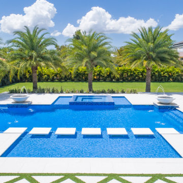 Edgy Pool With Custom Bowls and Stepping Stones in Plantation, Florida