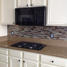 Brown Kitchen Counters Black Appliances