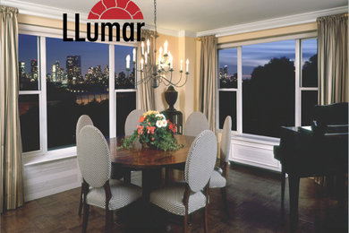 Example of a mid-sized classic dark wood floor dining room design in Minneapolis with beige walls and no fireplace