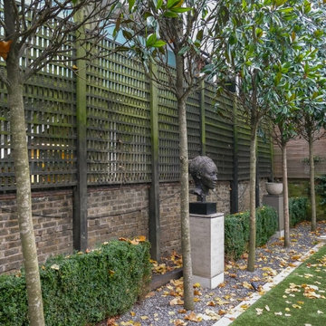 Amazing Sculpture gets Highlighted with Artificial Foliage