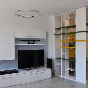 Restyling della zona living - libreria a giorno